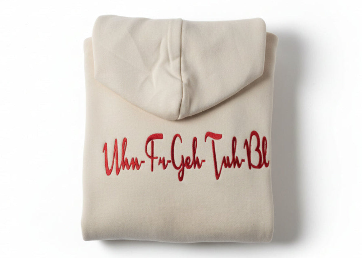 Cream Hoodie with red embroidered UHN-FR-GEH-TUH-BL script logo