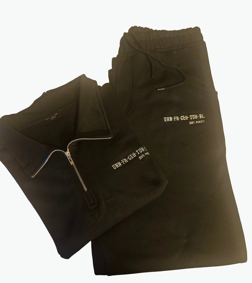 Quarter Zip Sweatsuit in Black with the UHN-FR-GEH-TUH-BL logo